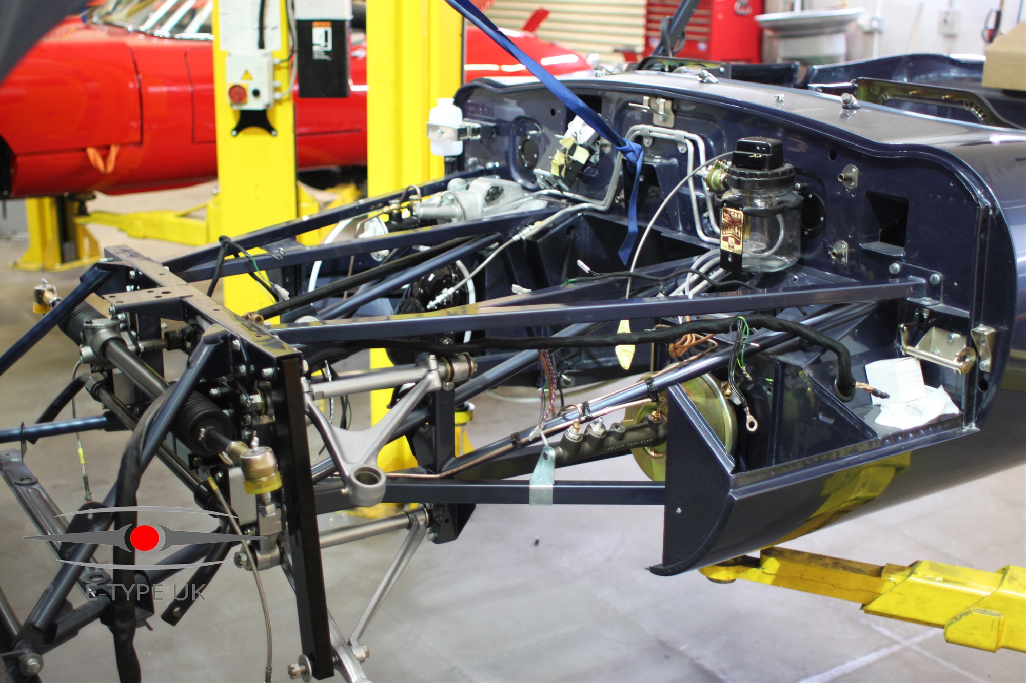 e type front suspension